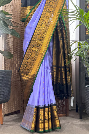 Handwoven mulberry Gadwal Silk saree with wide intricate kuttu border