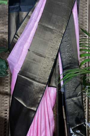Pink Handwoven Kanchipuram silk saree with wide black non zari border with Viduthalai and Rudraksha motives.