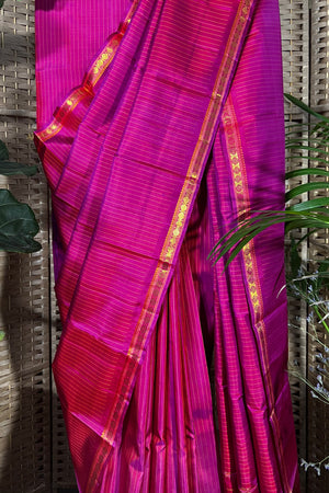 Magenta with a dash or purple handwoven Kanchipuram Silk saree