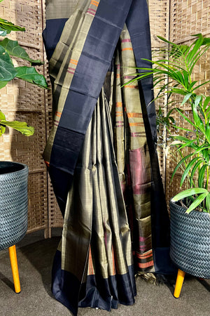 Handwoven Camouflage Green pure Kanchipuram silk with plain border and long multi color temple weave on body