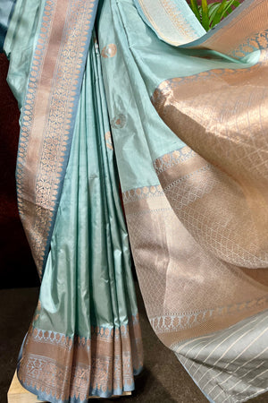 Handwoven Pastel Green Banarasi katan silk saree with kadua weave border