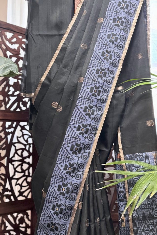 Black color body, Zari round buta, bluish color woven border and Pallu with gold Selvedge Soft Silk saree