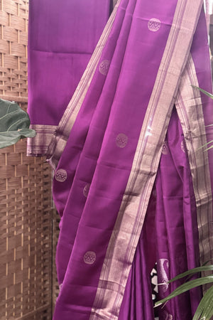 Purple color soft silk saree with zari butis all over body