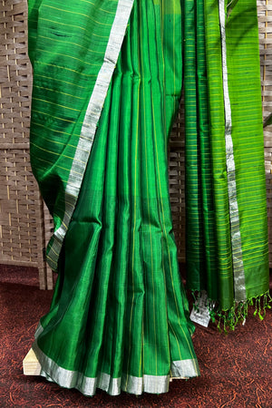 Handwoven Parrot Green light soft silk saree with dupion lines