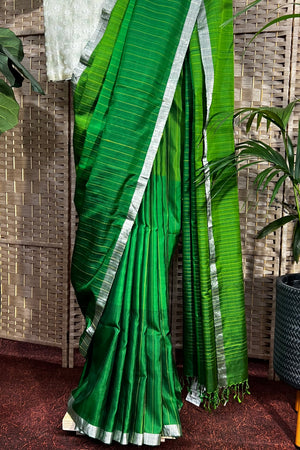 Handwoven Parrot Green light soft silk saree with dupion lines