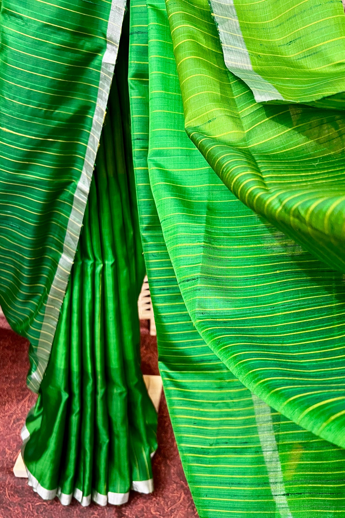 Handwoven Parrot Green light soft silk saree with dupion lines