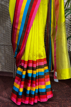 Handwoven Mustard yellow Donal Chanderi silk saree with multi color contemporary border