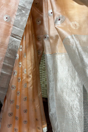 Handwoven Peach color pure Chanderi silk with  closely  woven meenakari butis all over saree