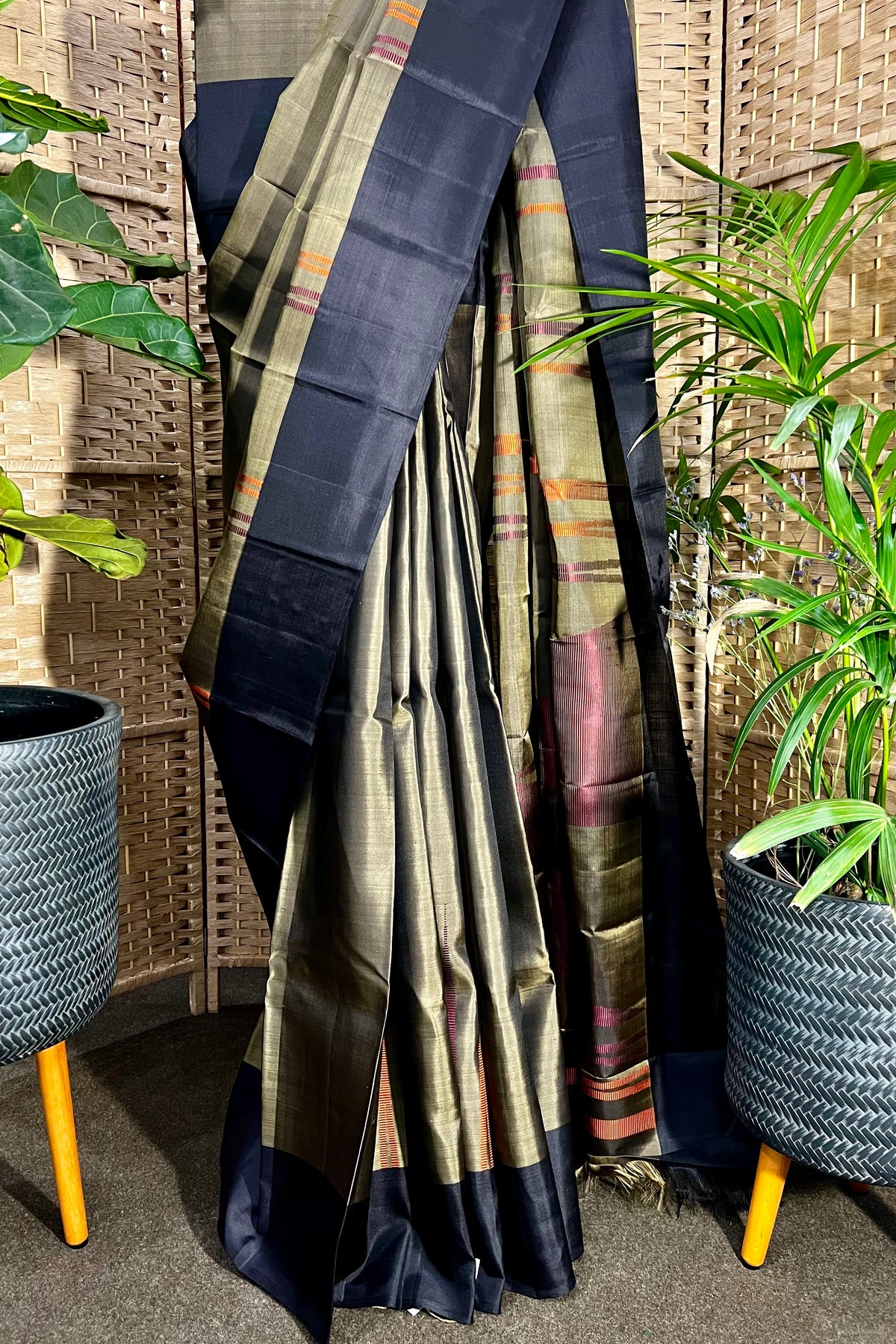 Handwoven Camouflage Green pure Kanchipuram silk with plain border and long multi color temple weave on body