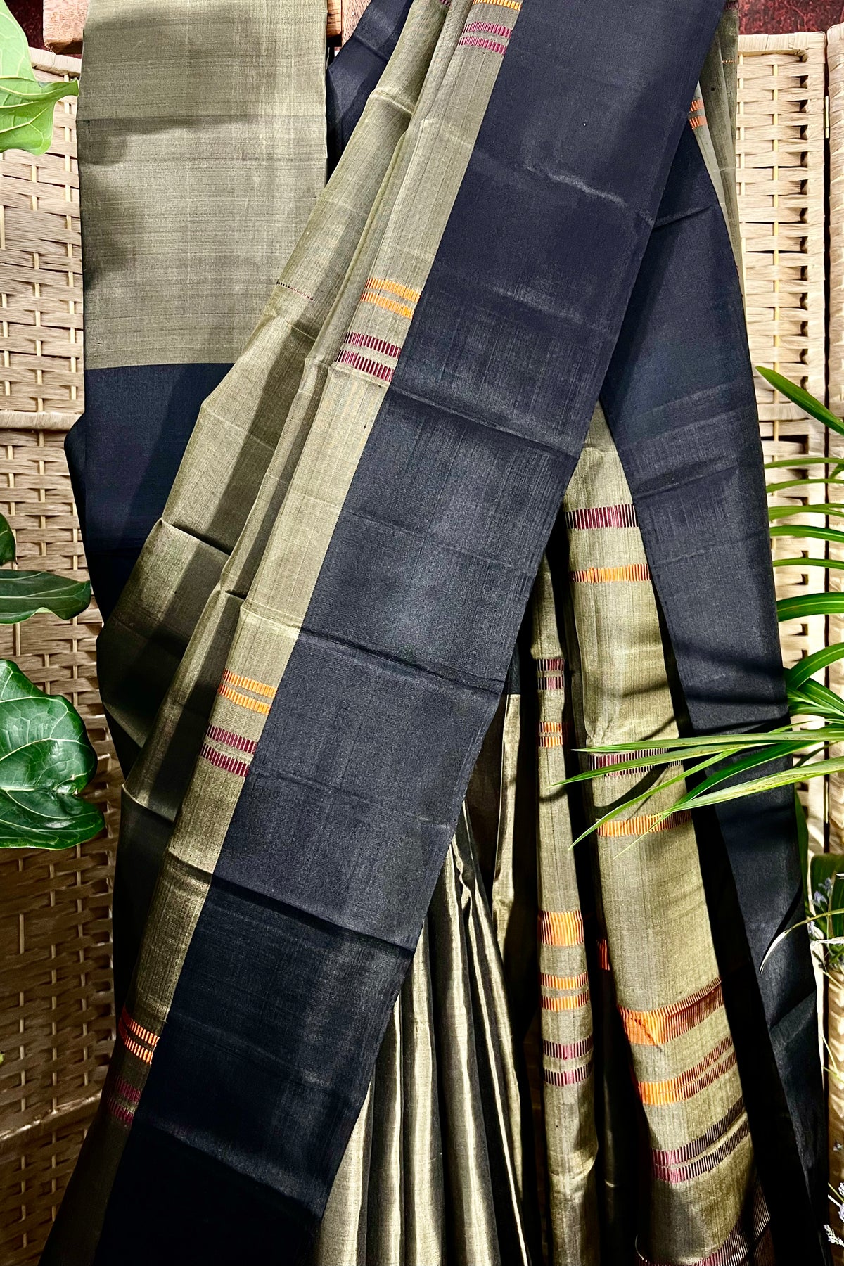 Handwoven Camouflage Green pure Kanchipuram silk with plain border and long multi color temple weave on body