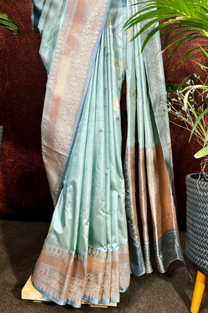 Handwoven Pastel Green Banarasi katan silk saree with kadua weave border